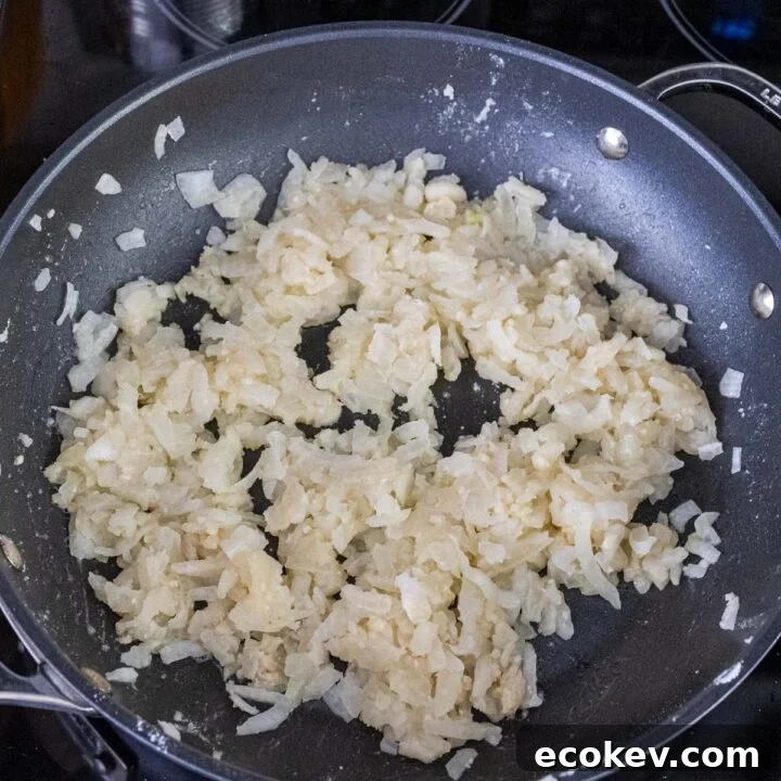Onions, garlic, flour and butter sauteed in a fry pan.