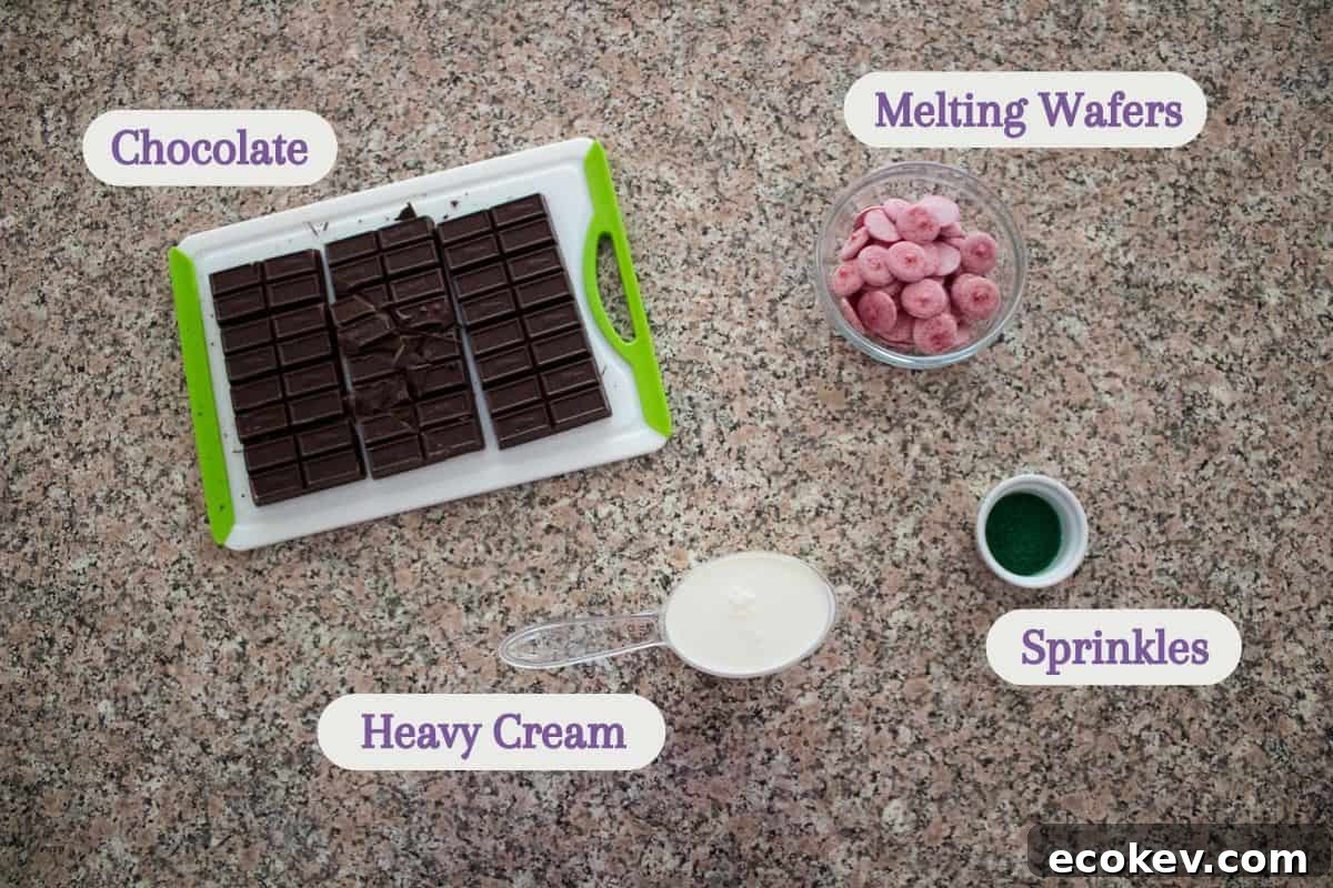 Labeled ingredients on a kitchen counter: chocolate, melting wafers, heavy cream, and sprinkles.