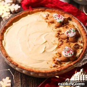 Eggnog pie in a glass baking dish on a table top.