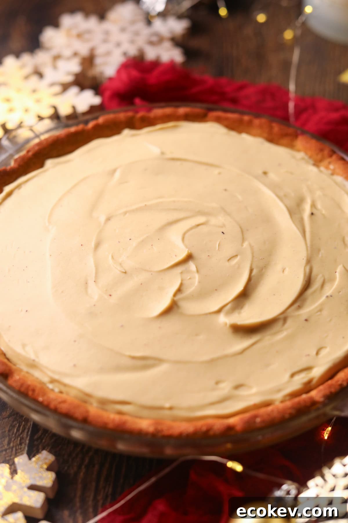 Chilled eggnog pie on a table top.