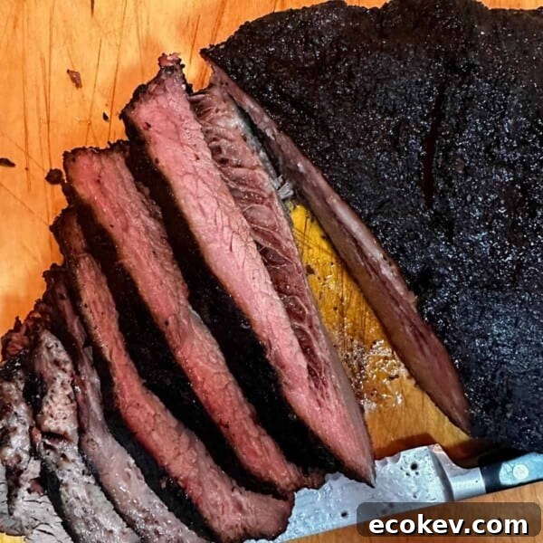 A sliced smoked brisket flat.
