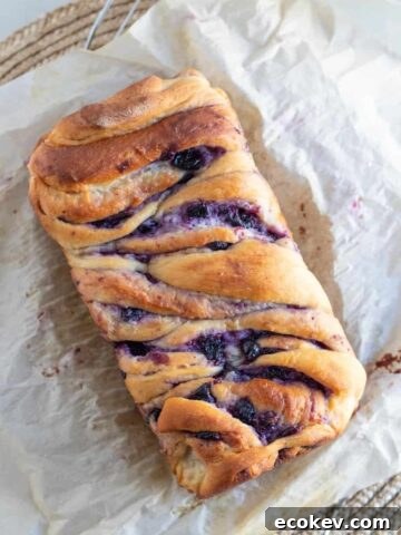 loaf of babka swirled with blueberries