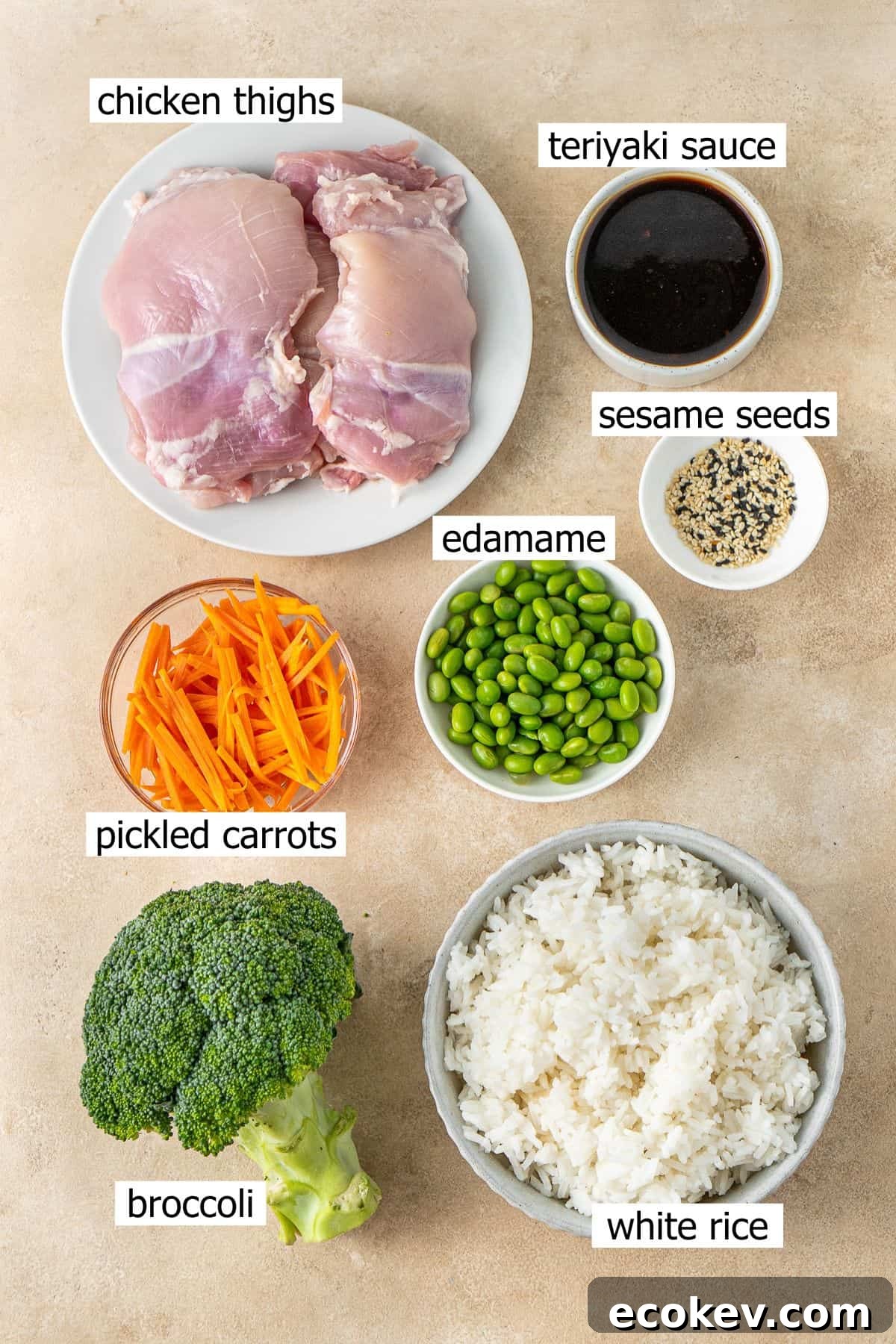 All ingredients needed to make teriyaki chicken bowls laid out in small bowls.
