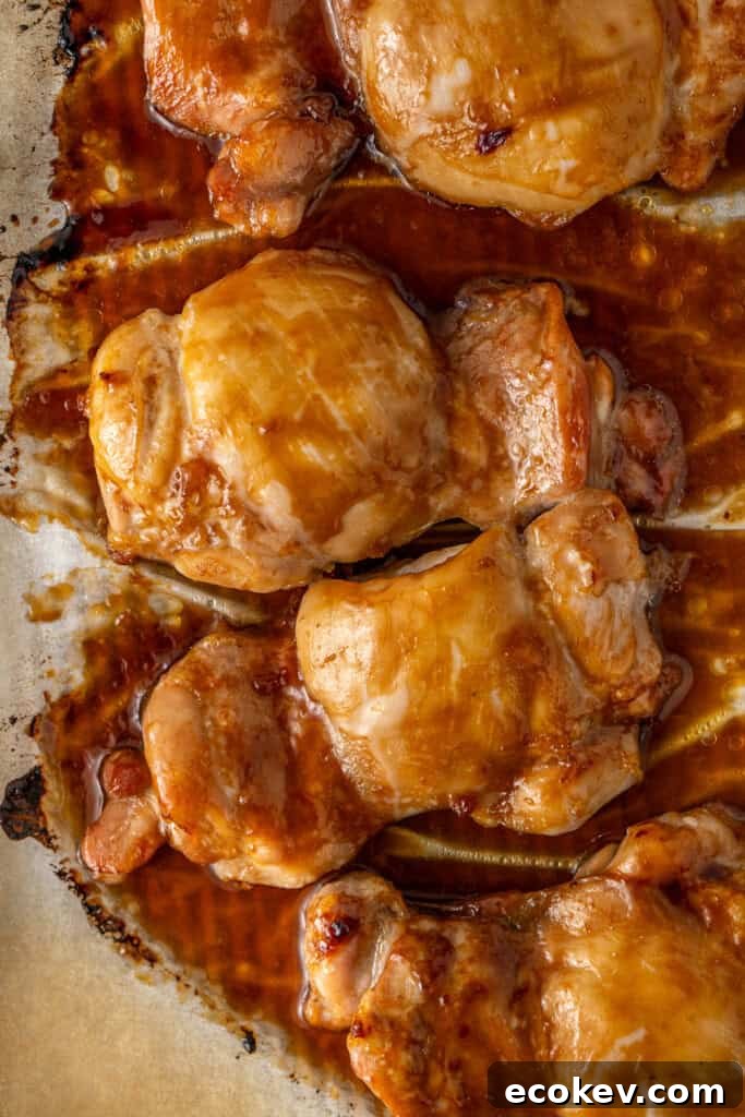 The cooked chicken on a baking tray.