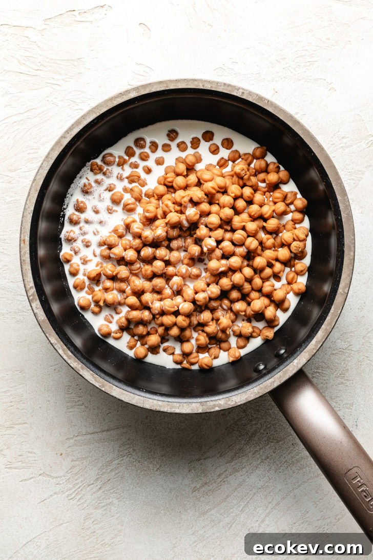 Caramel bits and cream in a pan.