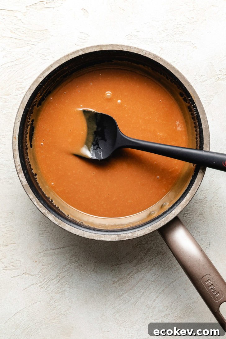 Pan of melted caramel sauce.