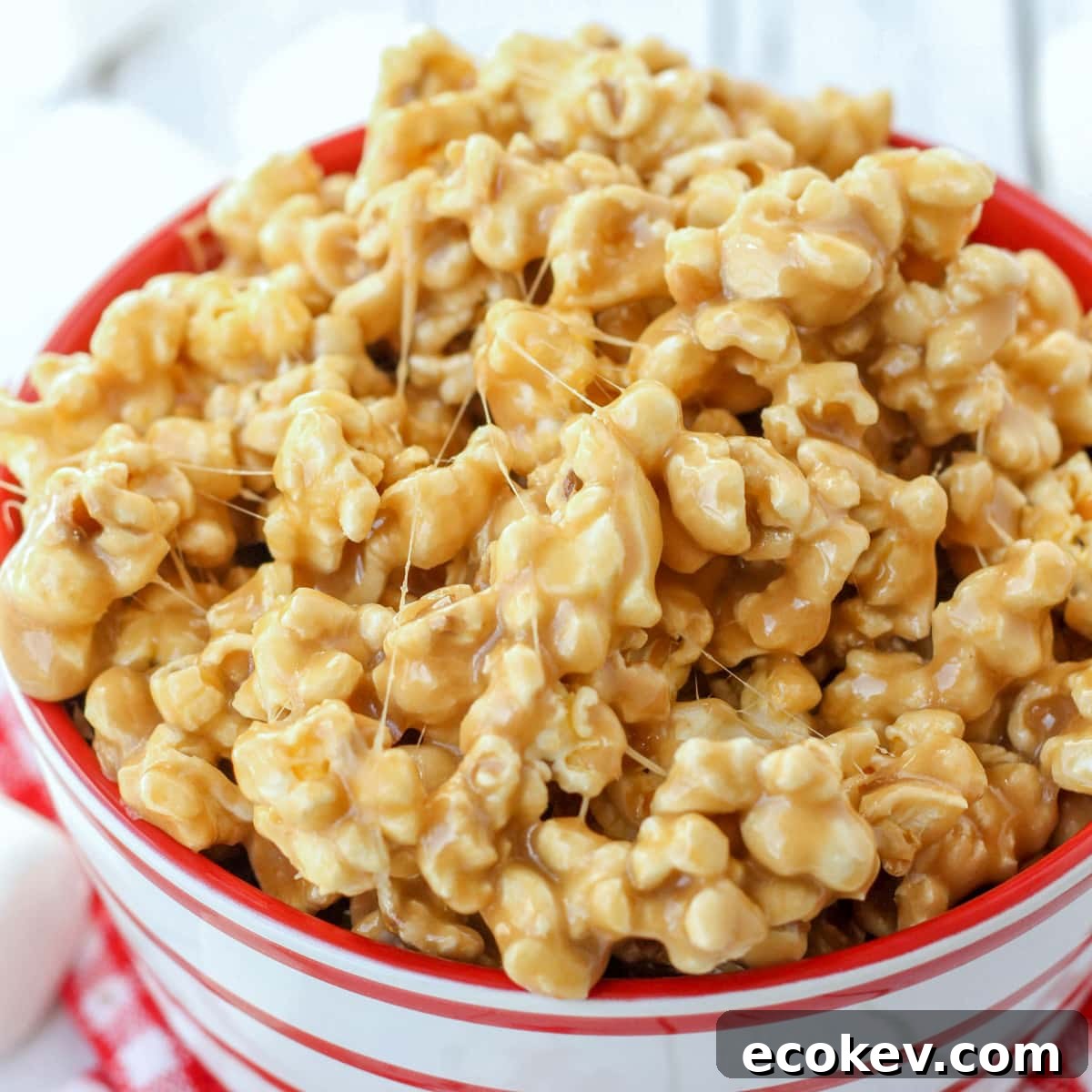Deliciously gooey 5-minute Caramel Marshmallow Popcorn is simple, quick, and perfect for parties and holidays! 