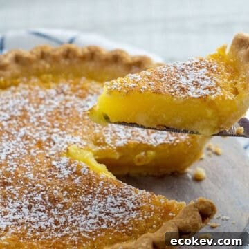 baked pie with lemon peel decoration on top