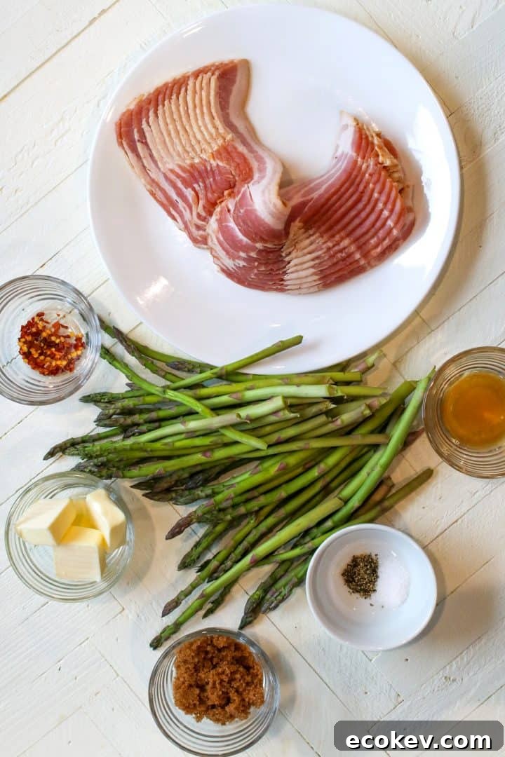 Ingredients needed for making air fried bacon wrapped asparagus.