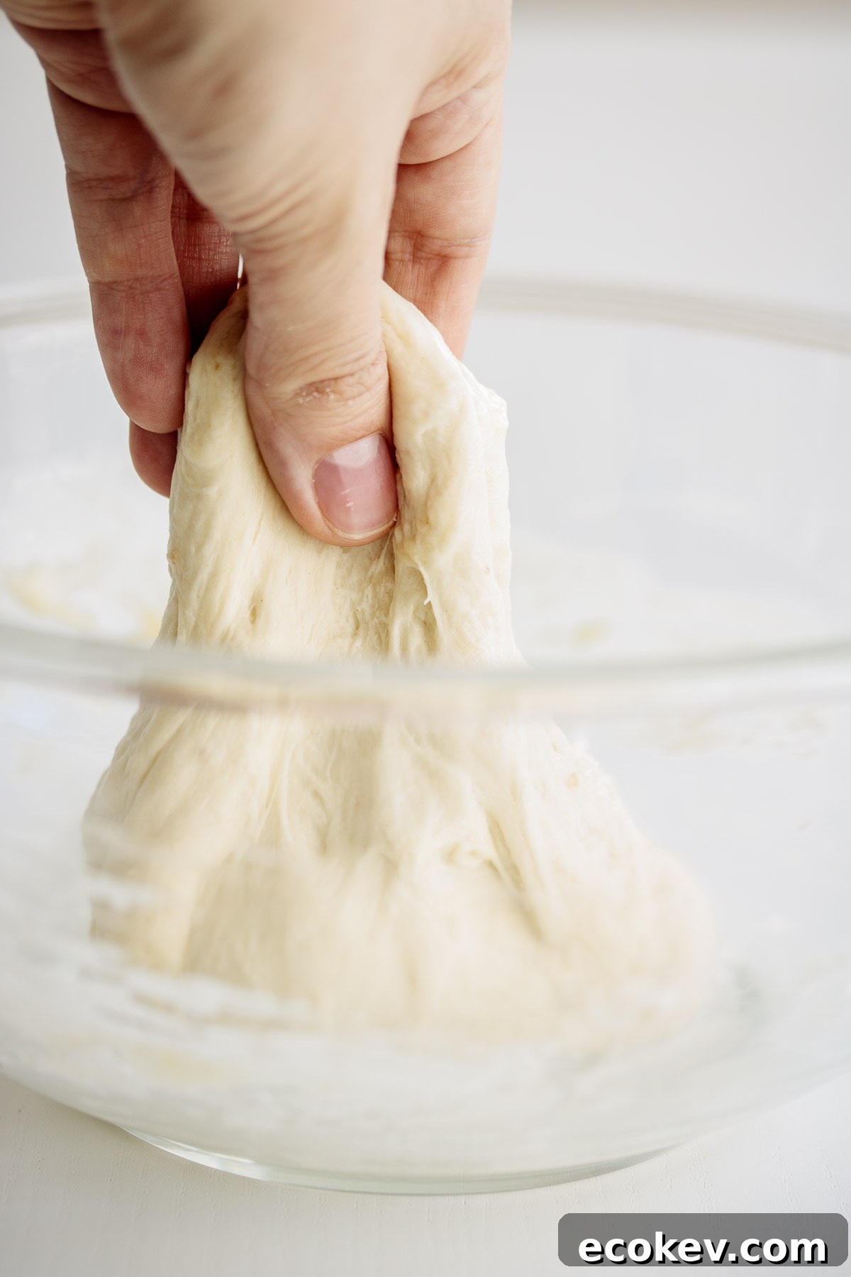 Hand pulling dough after 2 hour rest.