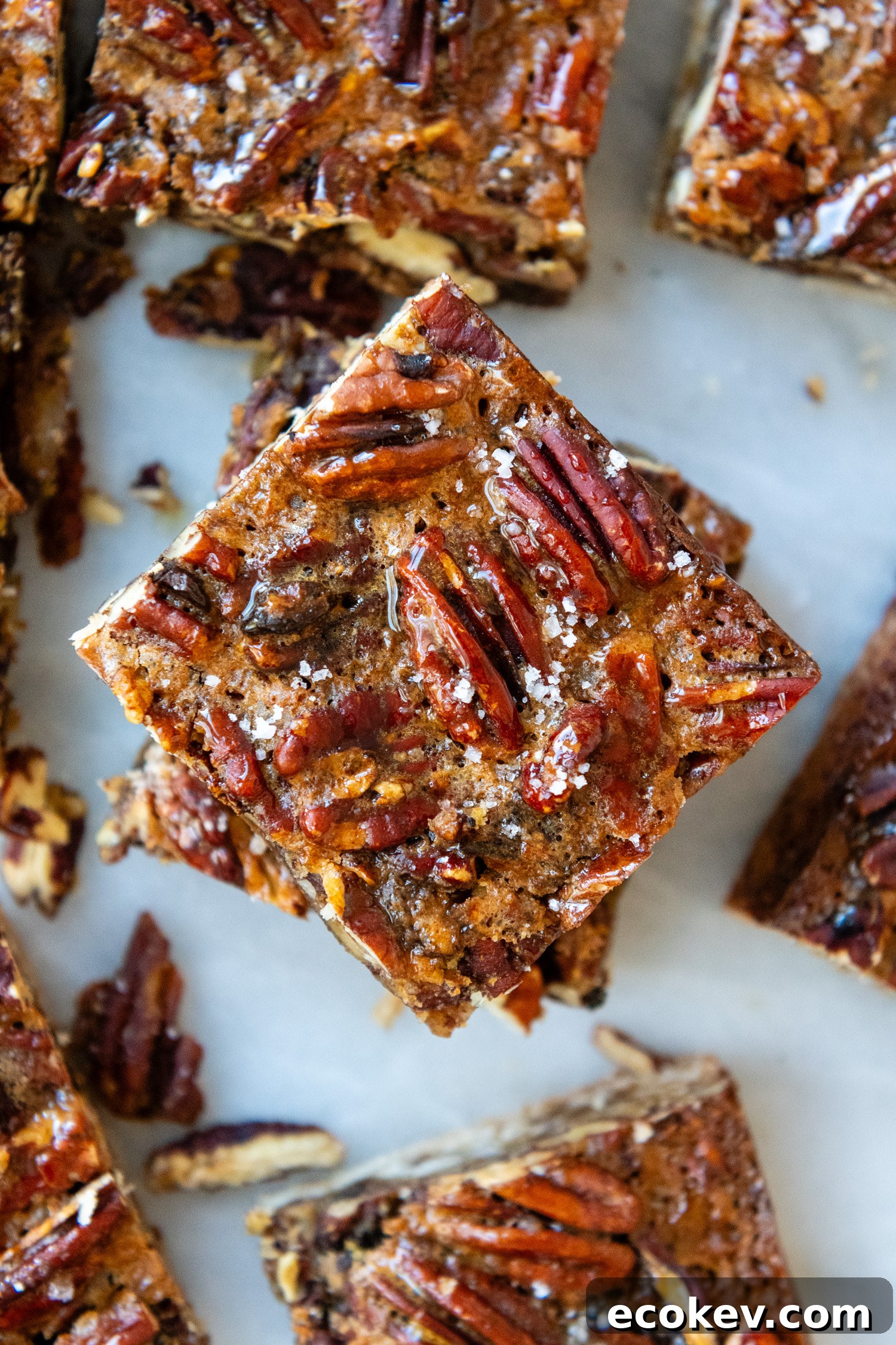 Overhead shot of bars showing detail of pecan crust.