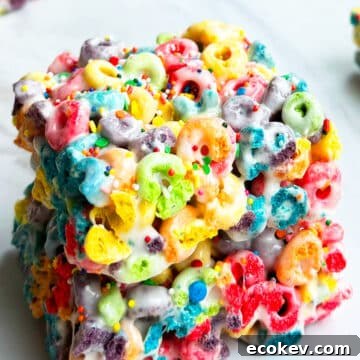 Stack of Easy Cereal Bars With Rainbow Froot Loops.