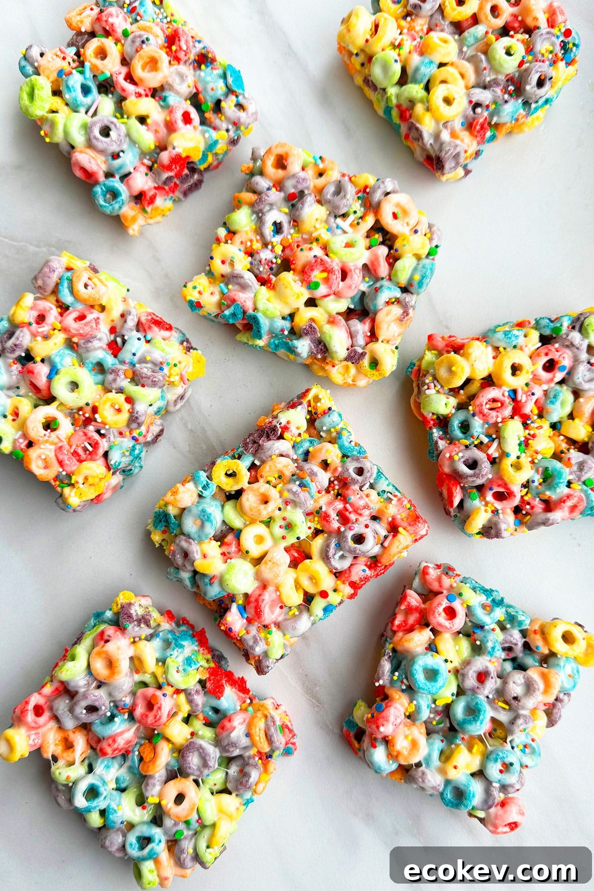 Many Marshmallow Bars Placed on White Marble Background. 