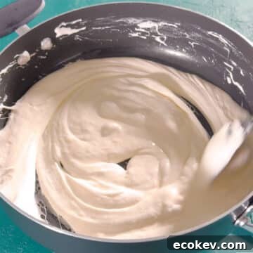 Smooth marshmallow mixture in nonstick pot. 