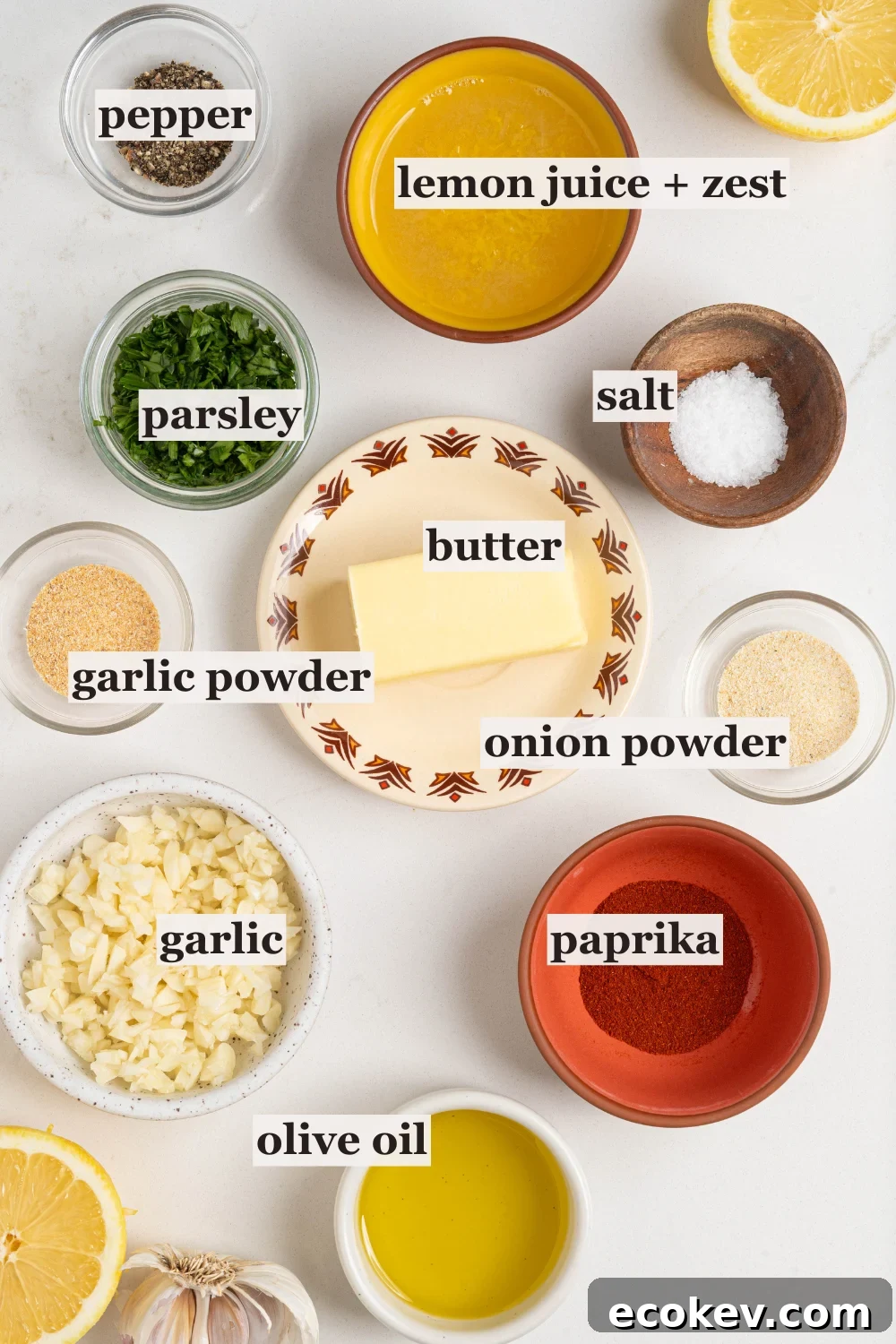 Bowls of lemon juice, butter, garlic powder, and more.
