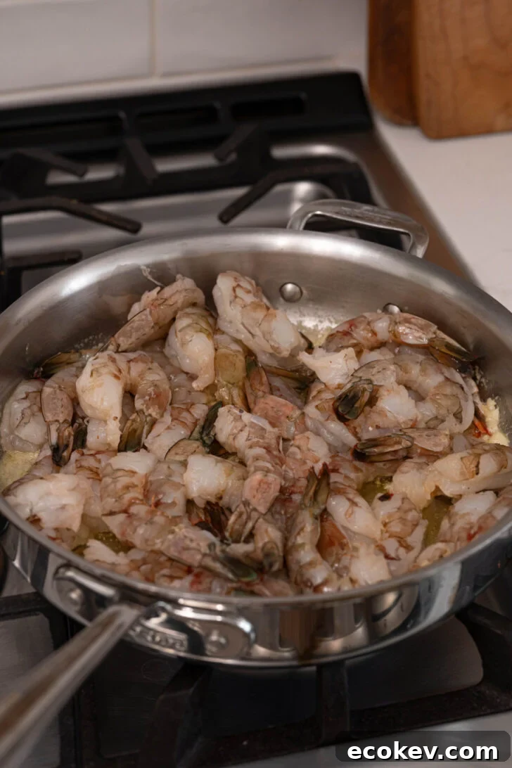 A pan with raw shrimp.