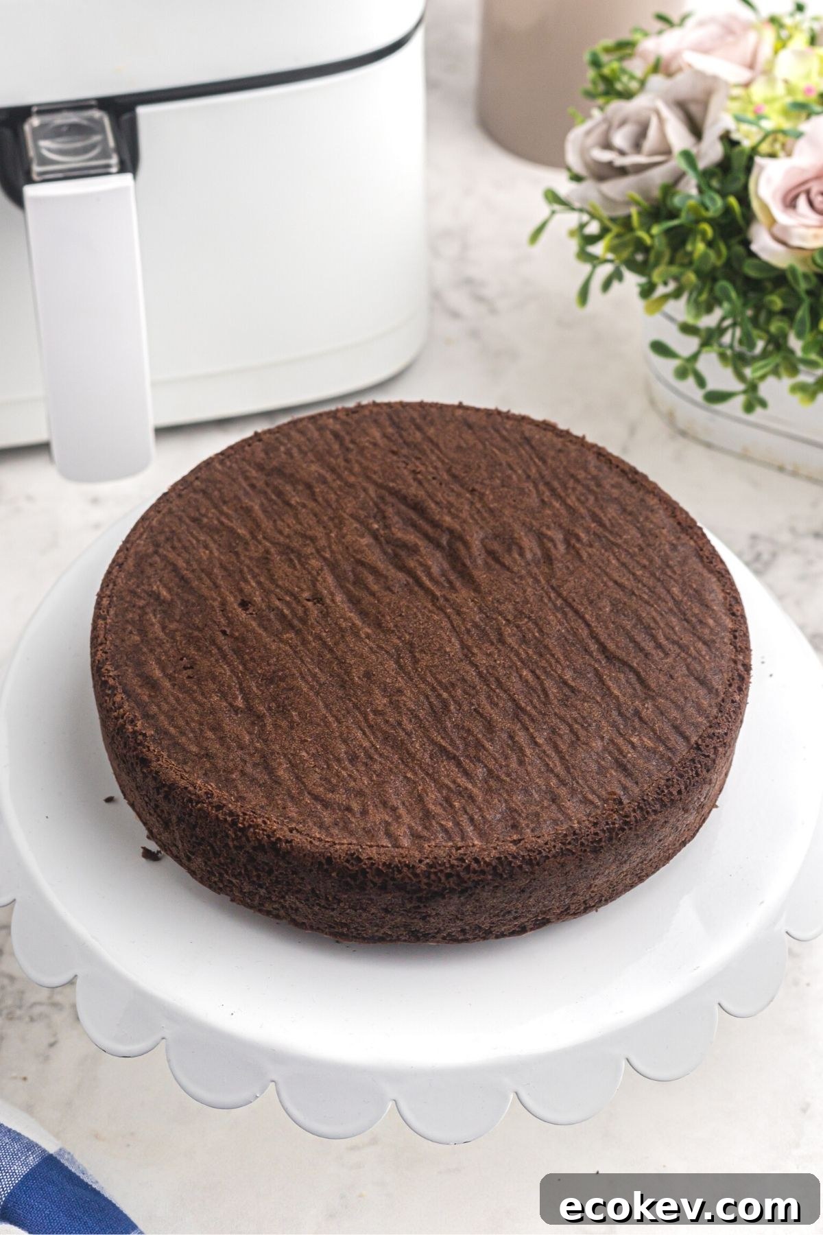Unfrosted baked cake after being cooked in the air fryer