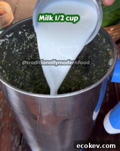 Milk added to the betel leaf mixture to create a smooth drink.