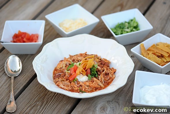 bowl of chicken chili with toppings