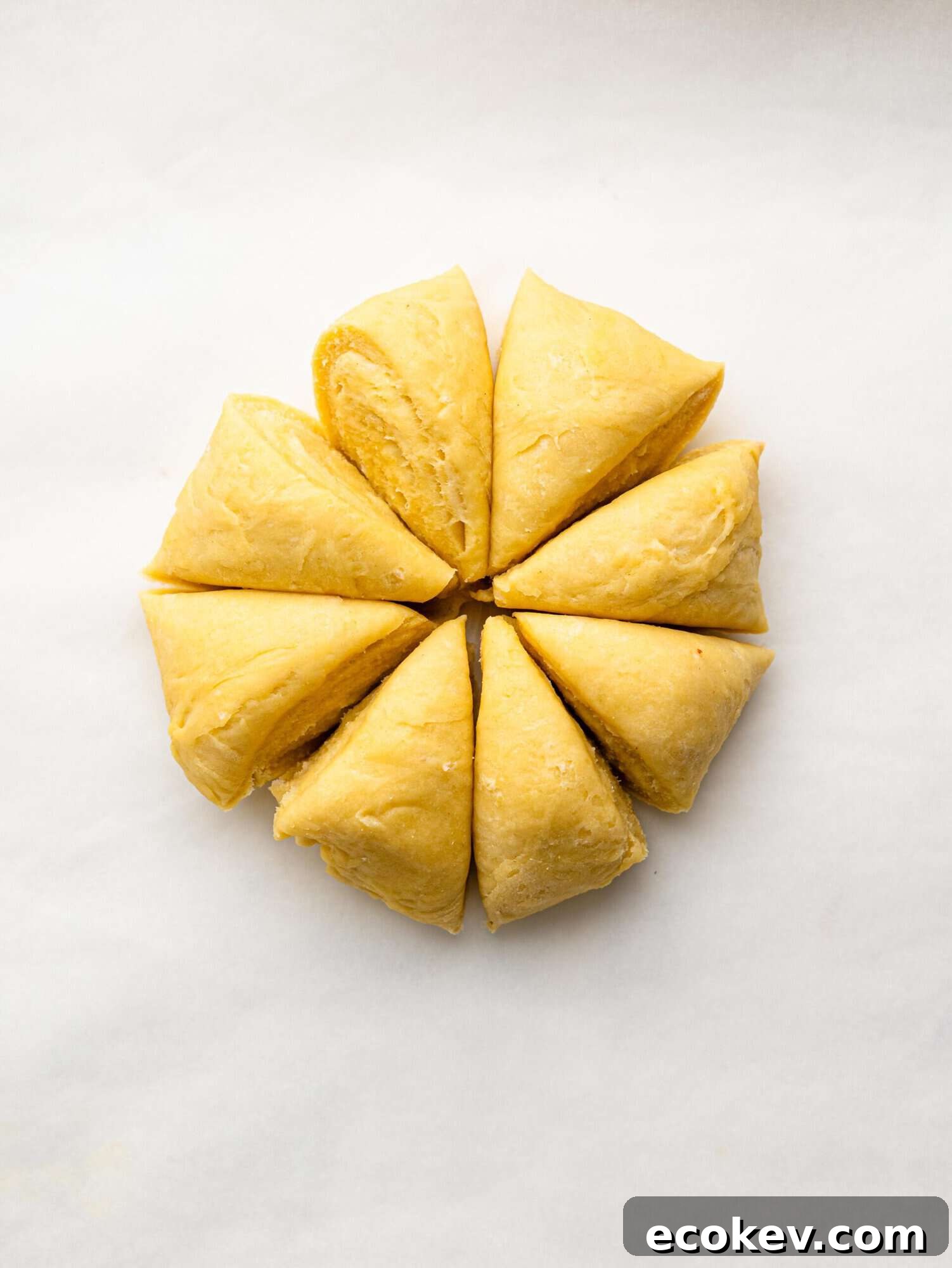 Easy empanada dough cut into 8 pieces.