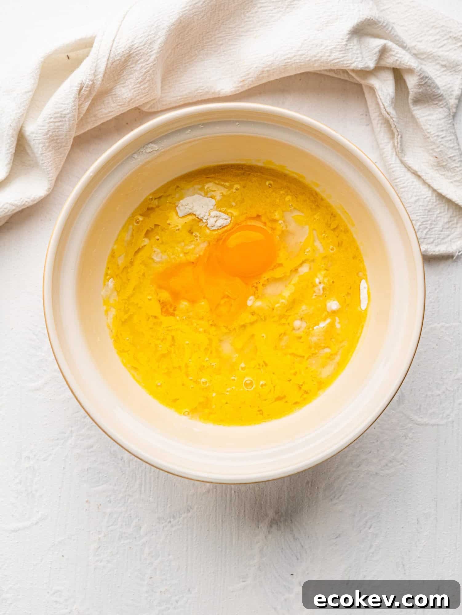 A bowl with the easy empanada dough ingredients.