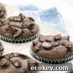 square imagae of 4 double chocolate banana muffins