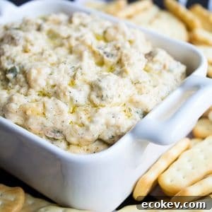 Slow Cooker Bacon Ranch Dip is my go to dip for game day. Super cheesy and studded with bacon, this easy to make dip is always a crowd pleaser!