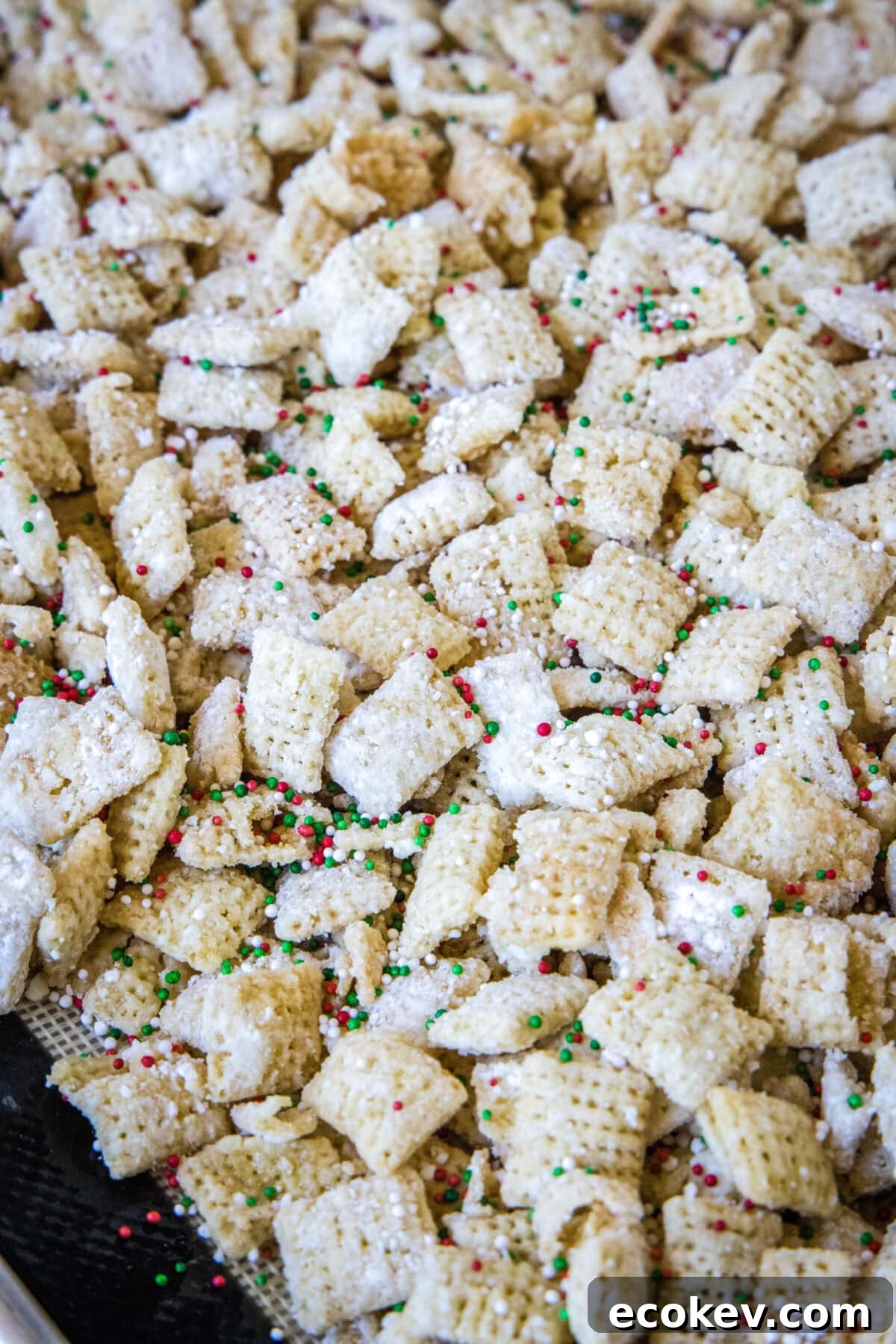 sugar cookie chex mix on baking sheet