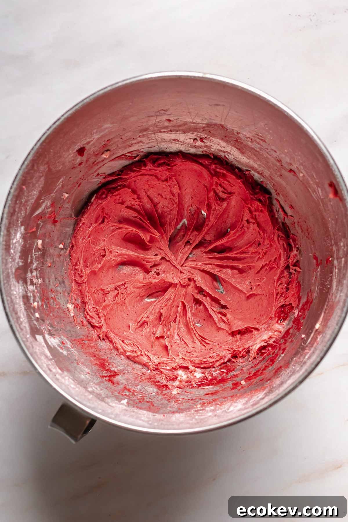 Freeze dried strawberry frosting in a bowl.