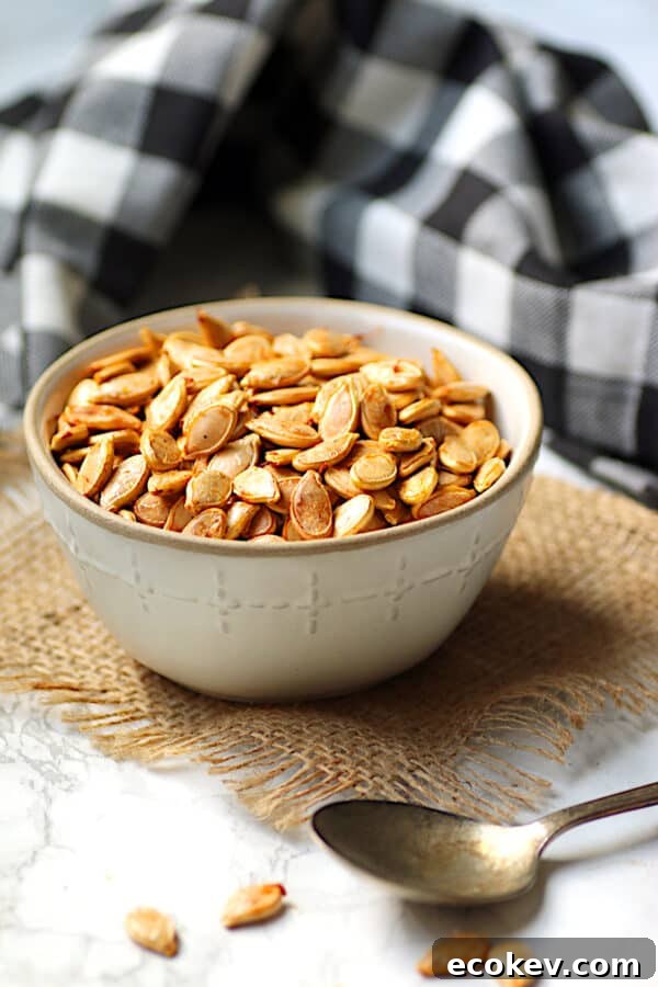 Homemade roasted pumpkin seeds in a bowl.