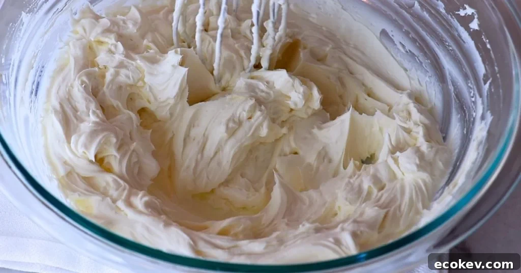 mixed cream cheese in a bowl