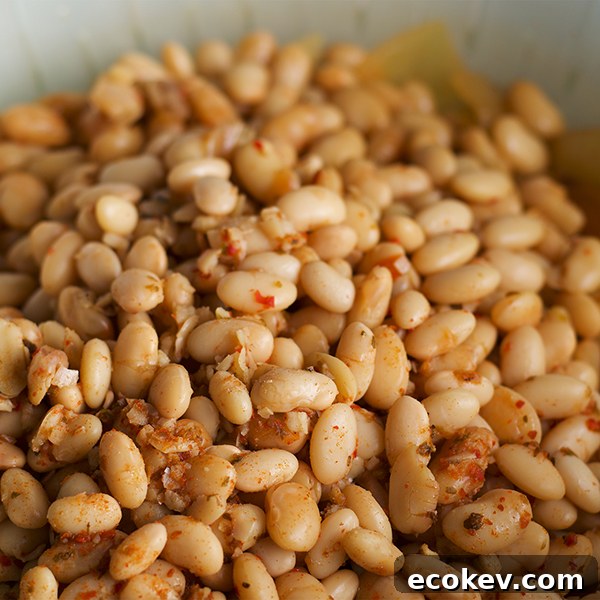 A pot of cooked white beans.