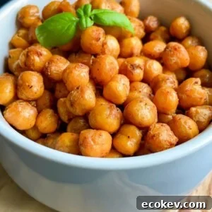 A white bowl filled with air fryer chickpeas.