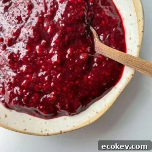 A bowl of thick, chunky chia jam.