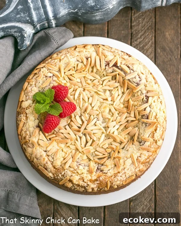 Overhead view Raspberry Cream Cheese Coffee cake topped with almonds.