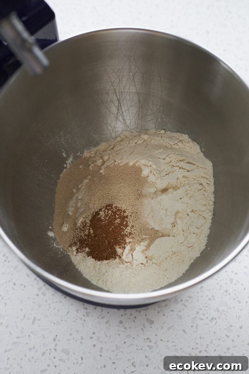 Dry ingredients in the bowl of a stand mixer.