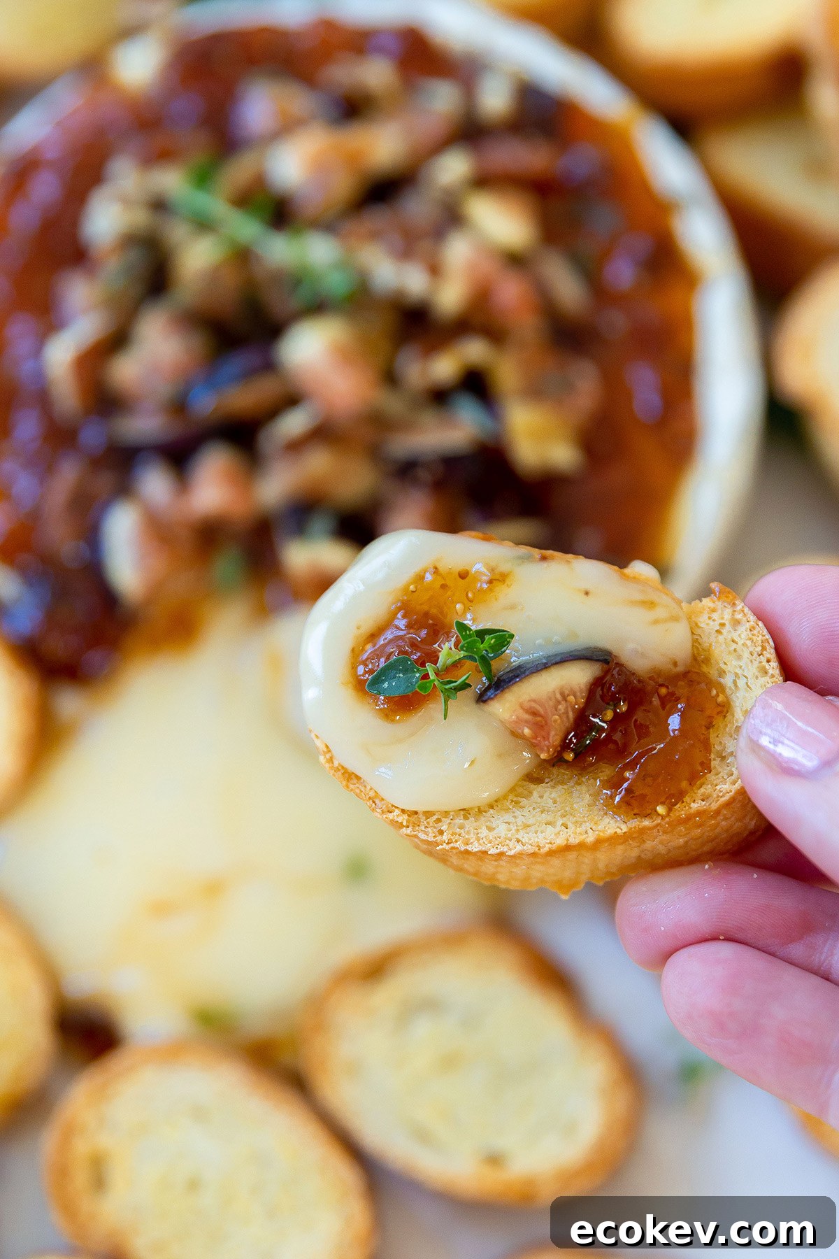 Cut into the baked Brie