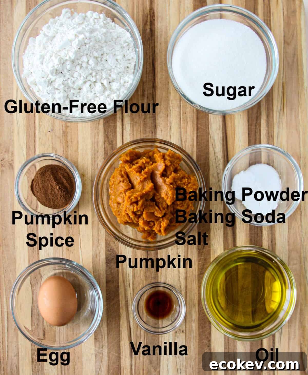 The ingredients for this recipe in glass bowls on a wooden board.