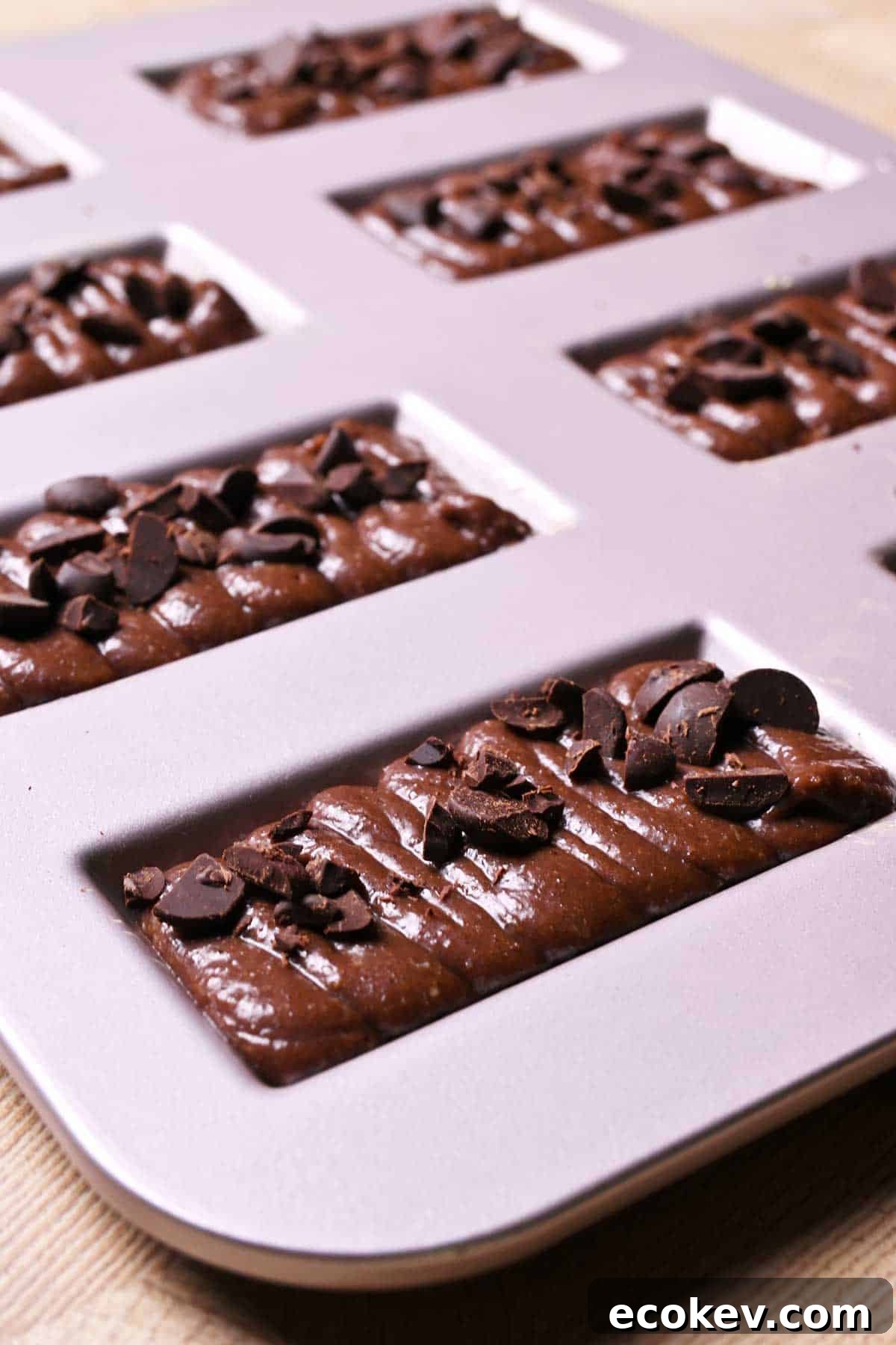 chocolate financier batter with chopped chocolate