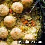 Winter vegetable and pearl barley stew with herby dumplings – a hearty, healthy and filling vegan vegetable stew topped with fluffy, herby dumplings. The perfect meal to warm you up on chilly days. #vegan #healthy #stew