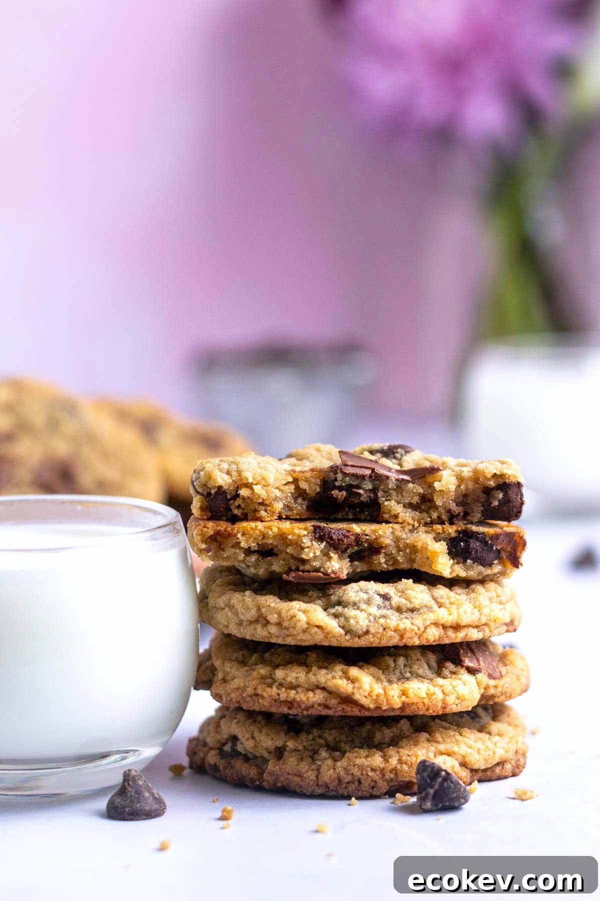 stack of egg free chocolate chip cookies with a glass of milk