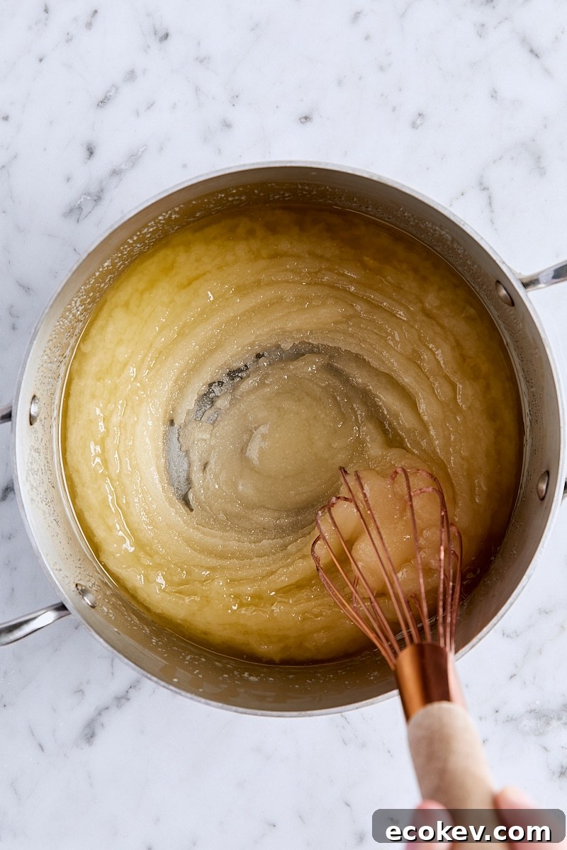 Sugar and melted butter whisked together in saucepan