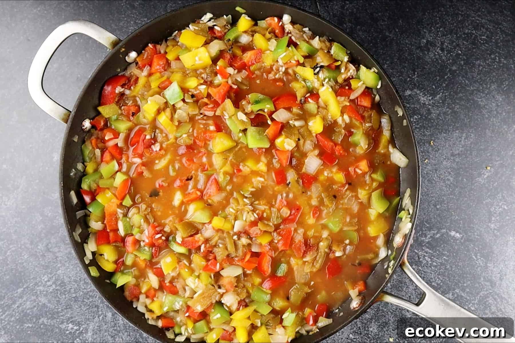 skillet with liquid simmering