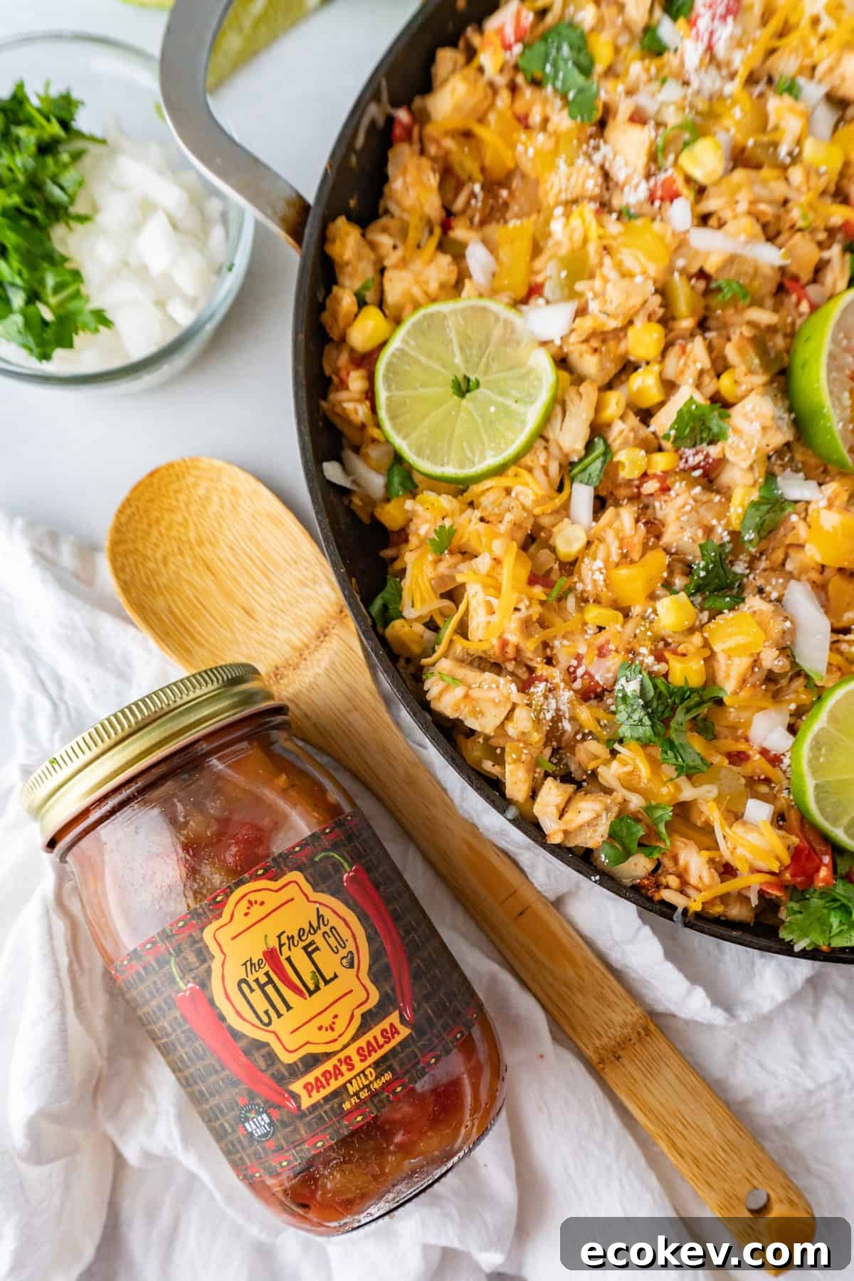 southwest chicken in pan next to jar of salsa