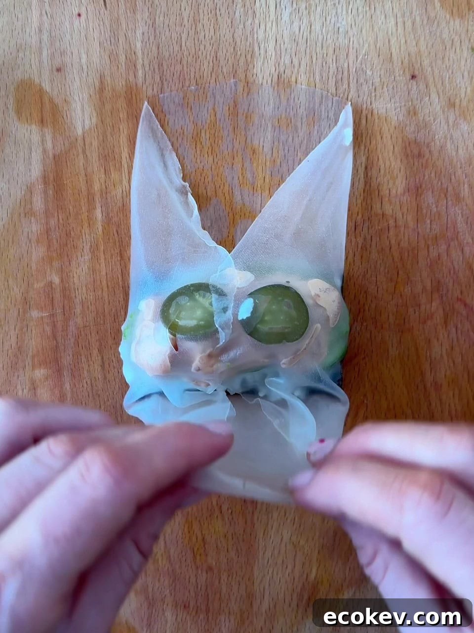 Fold the rice paper around the filling to form a pocket