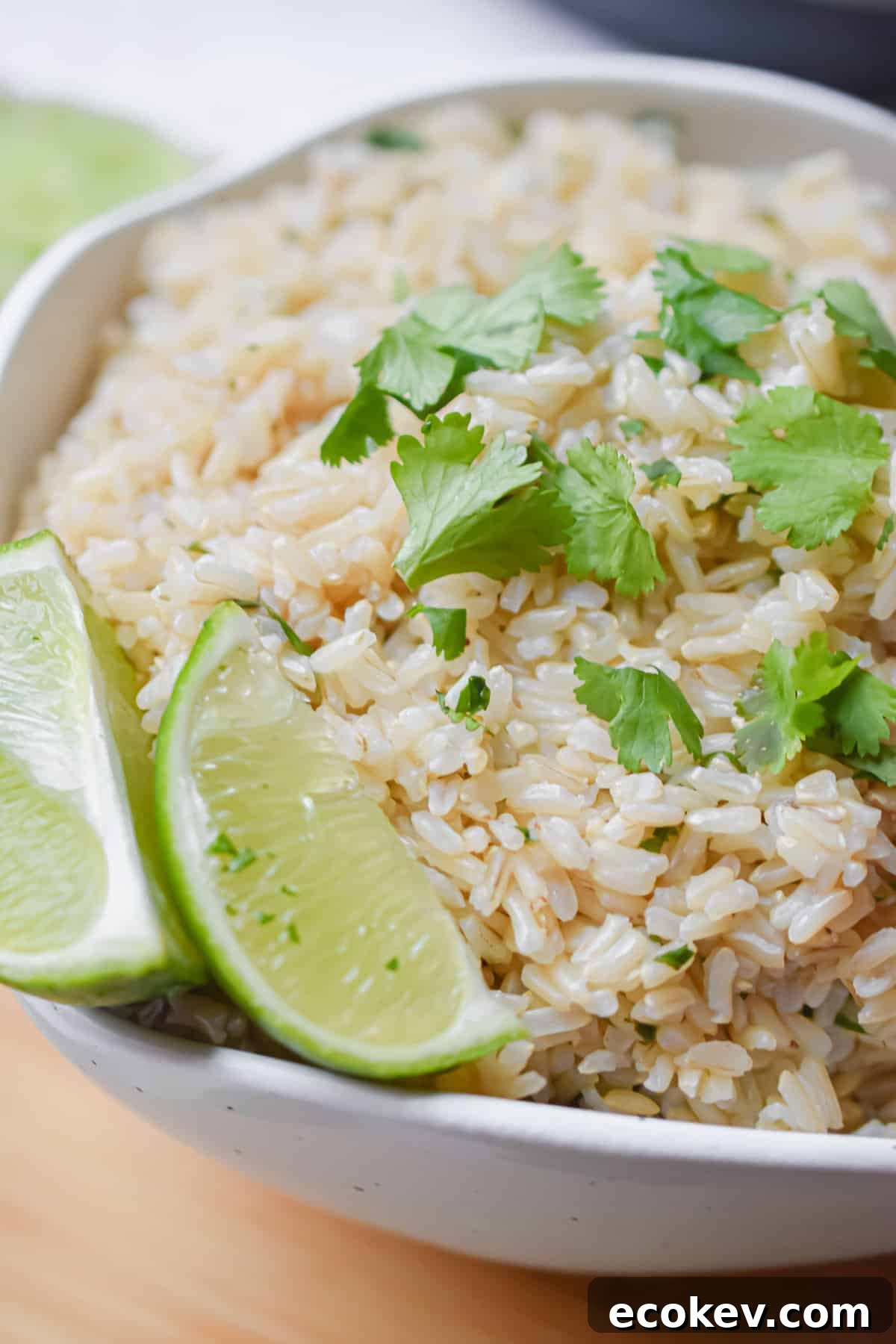 A close up of the limes in the bowl of rice.