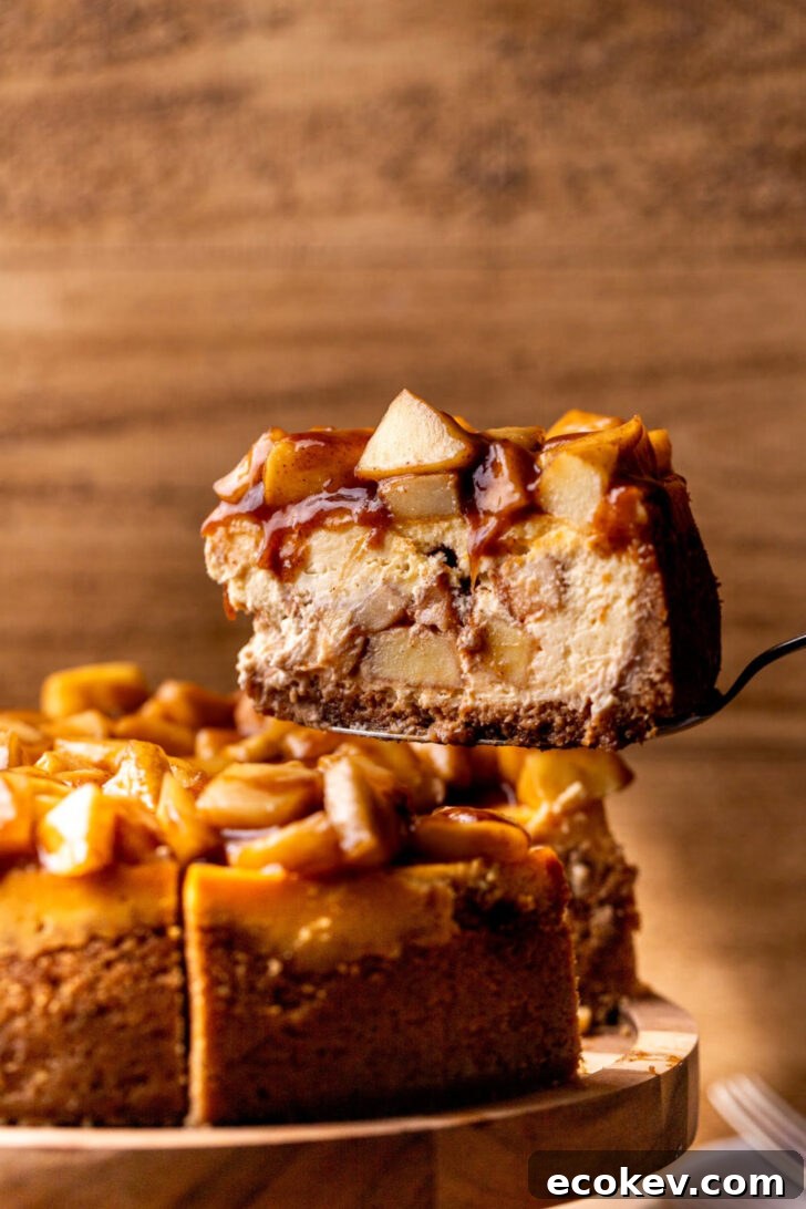 Taking a slice out of the apple cheesecake.
