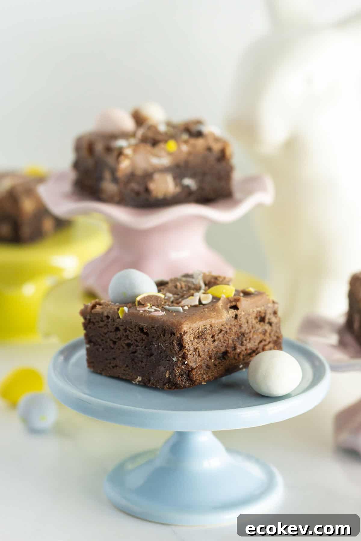 Mini Egg Brownies on mini cake plates.