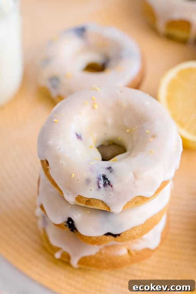 stack of donuts on a yellow placemat