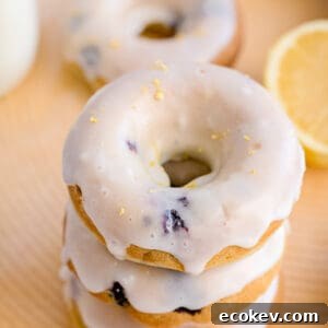 stack of donuts on a yellow placemat